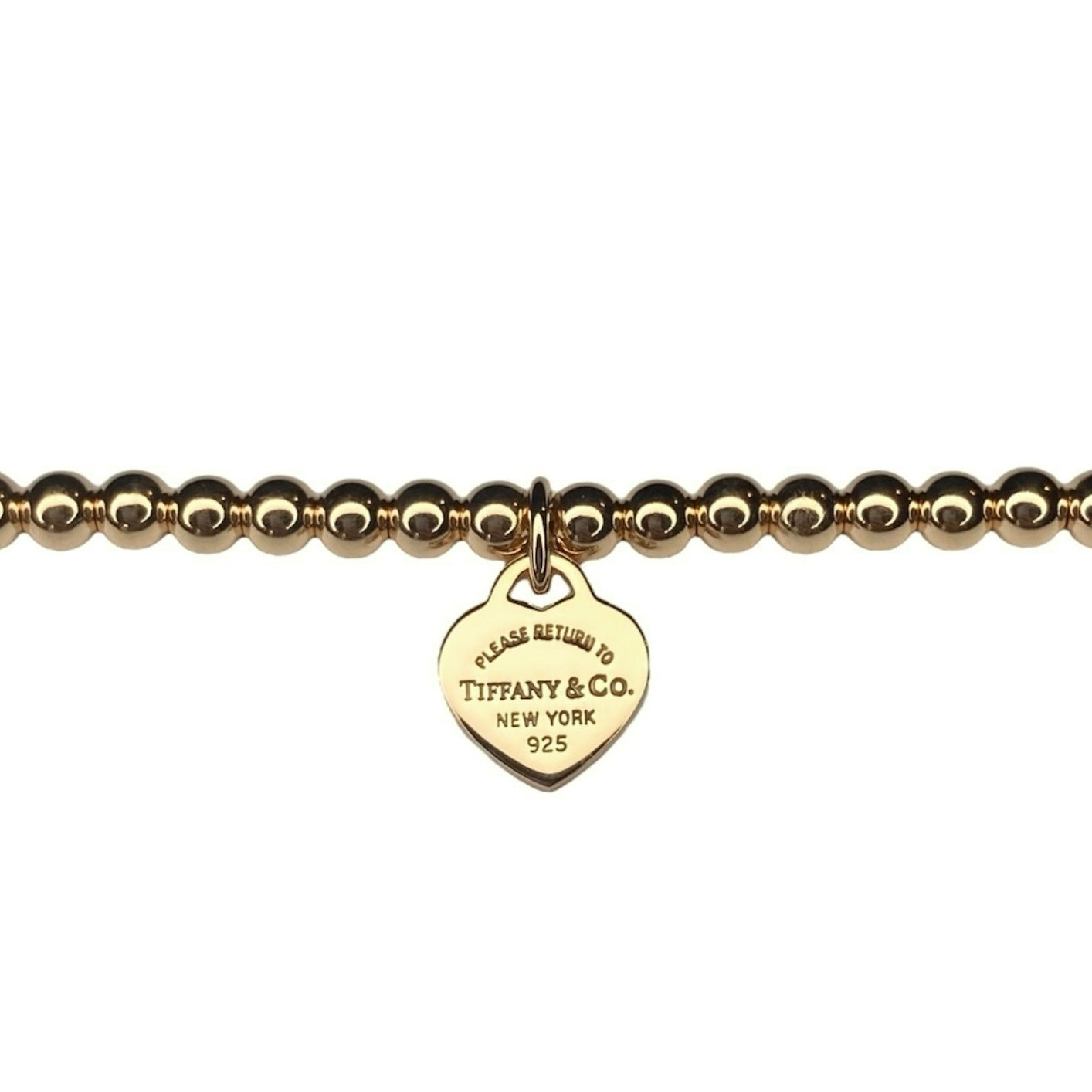 Tiffany & Co. goldplated heart on extra ball bracelet