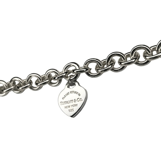 Tiffany & Co. link bracelet with a silver heart pendant
