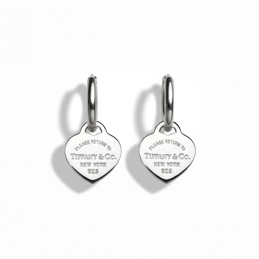 Tiffany & Co. silver hearts on extra earrings 