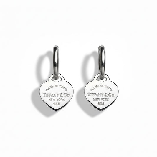 Tiffany & Co. silver hearts on extra earrings 
