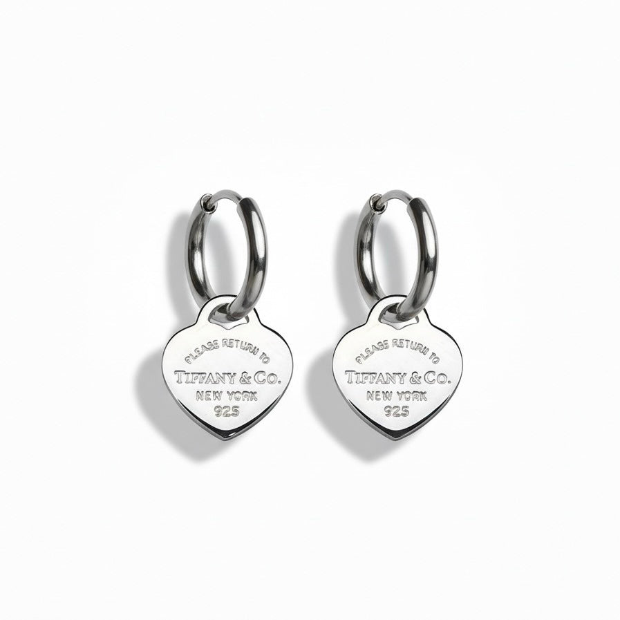Tiffany & Co. silver hearts on extra earrings 