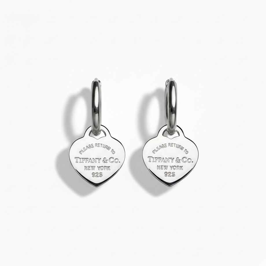 Tiffany & Co. silver hearts on extra earrings 