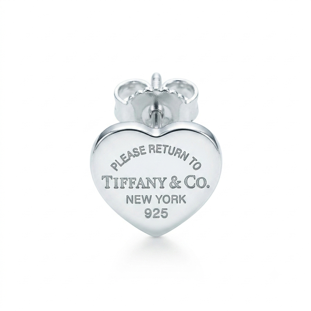 Tiffany & Co. silver hearts on extra earrings 